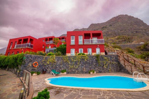 Гостиница Viviendas Vacacionales Jardín La Punta  Эрмигва